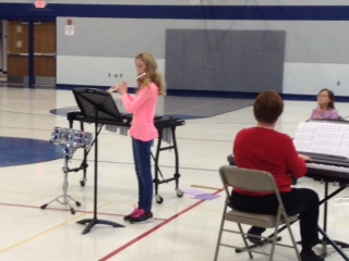 Kayla playing her solo